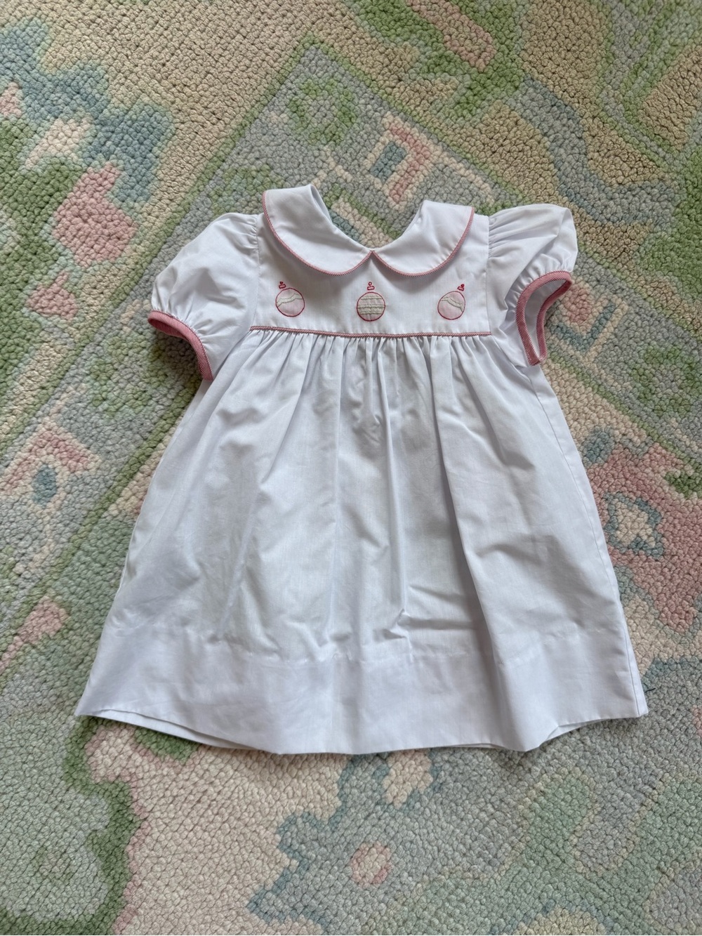 White Baby Dress with Pink Trim and Embroidered Appliqué Ornaments